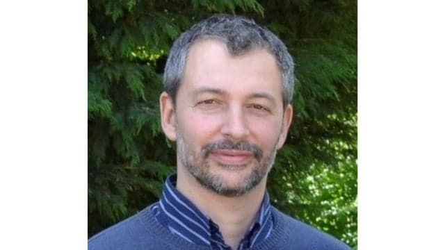 Overcoming the rate–distance limit of quantum key distribution